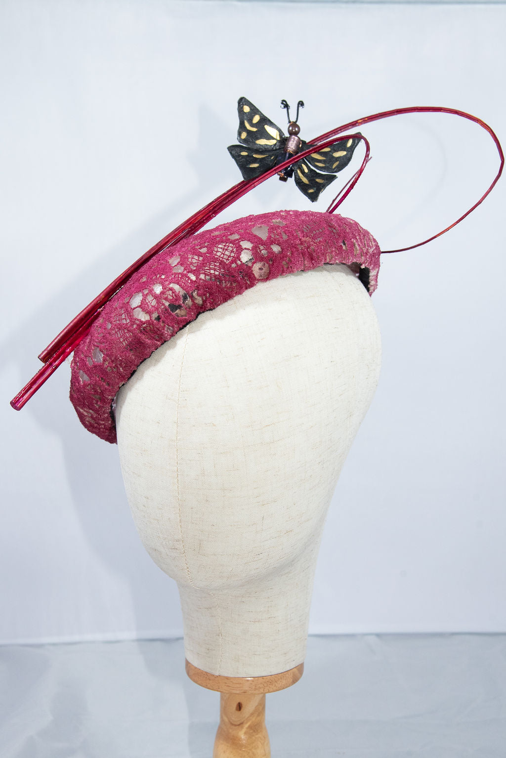 Cerise lace side beret with buttefly