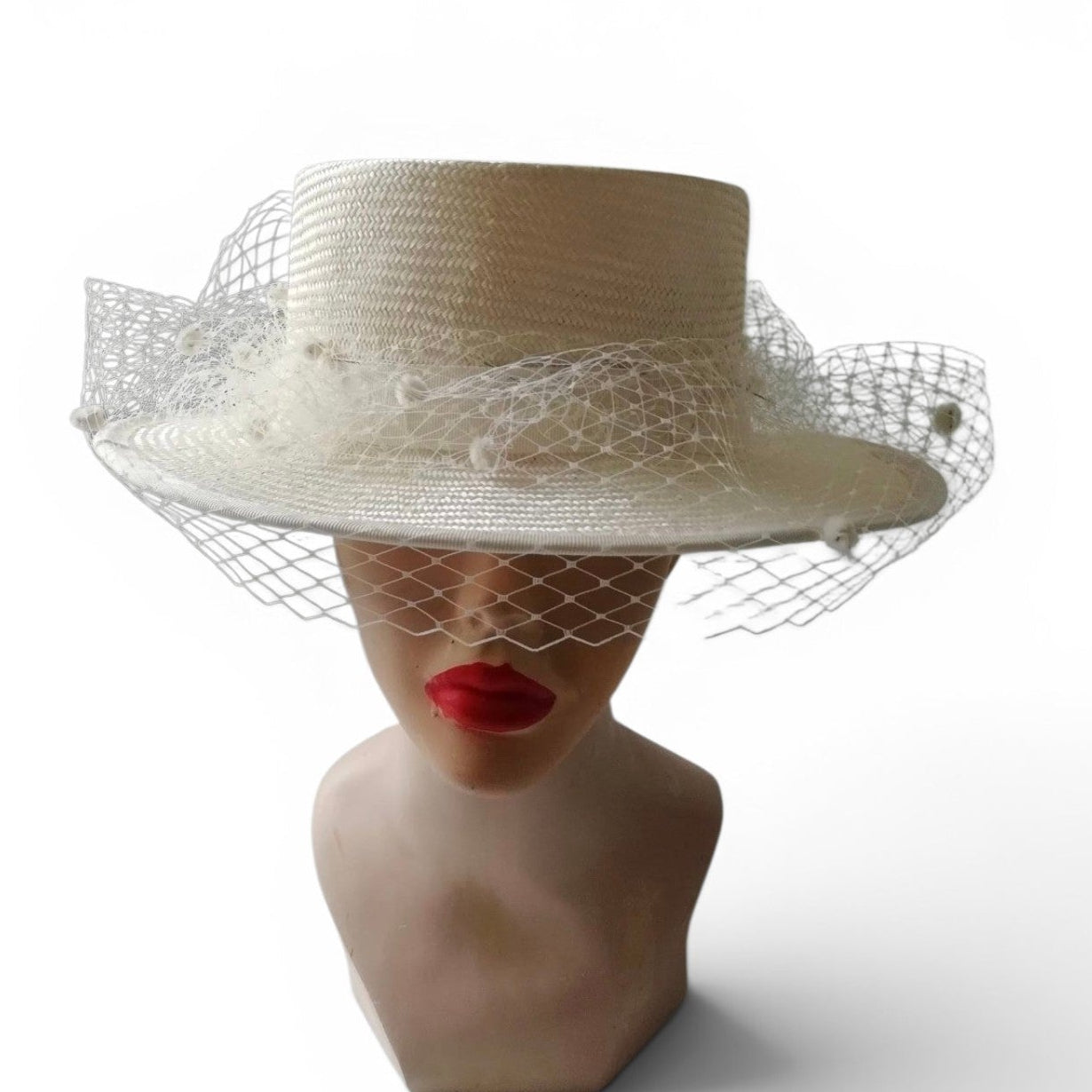 Straw boater with veiling