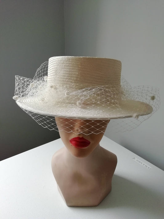 Straw boater with veiling