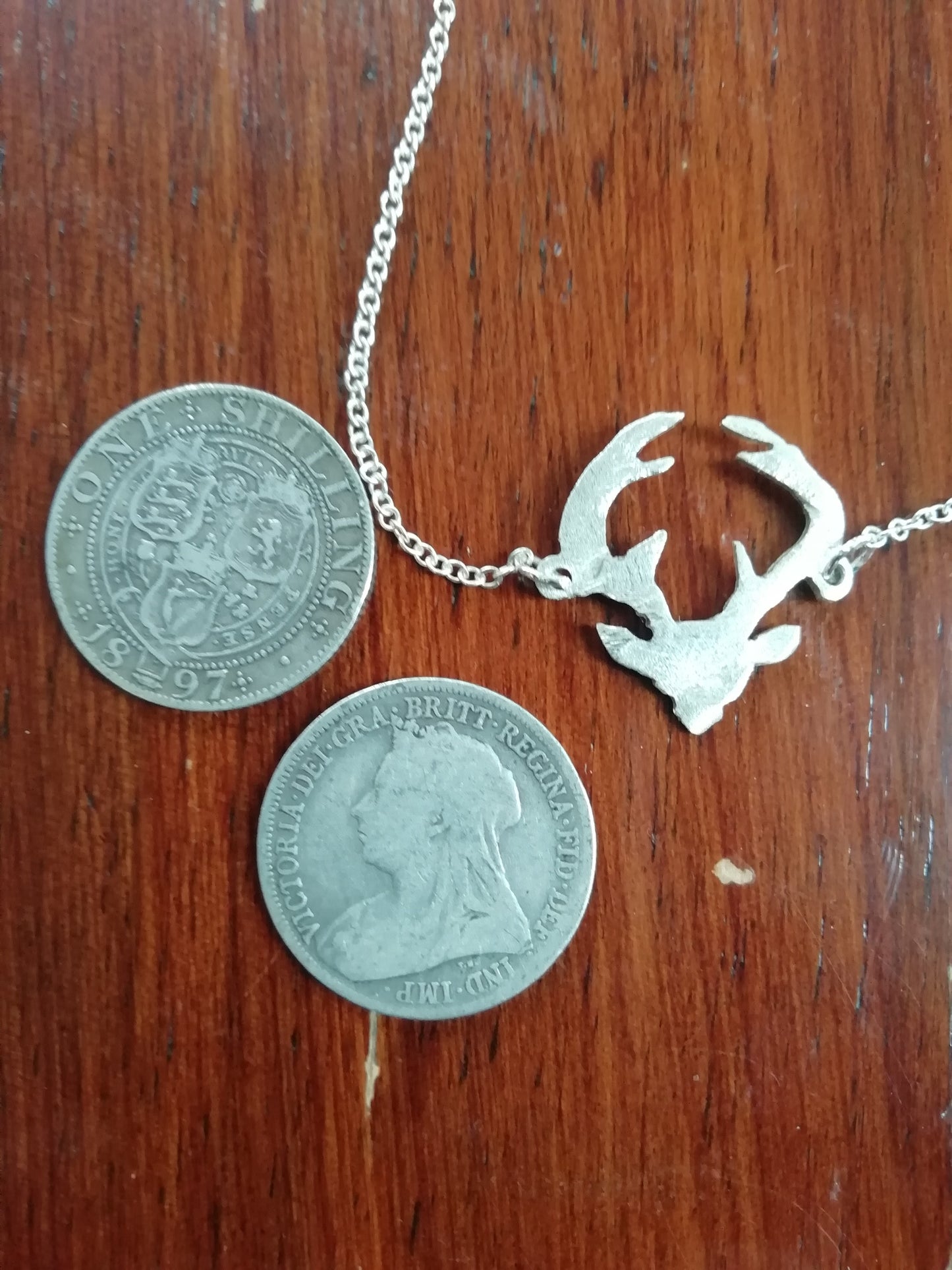 Stag pendant handcut from one shilling coin