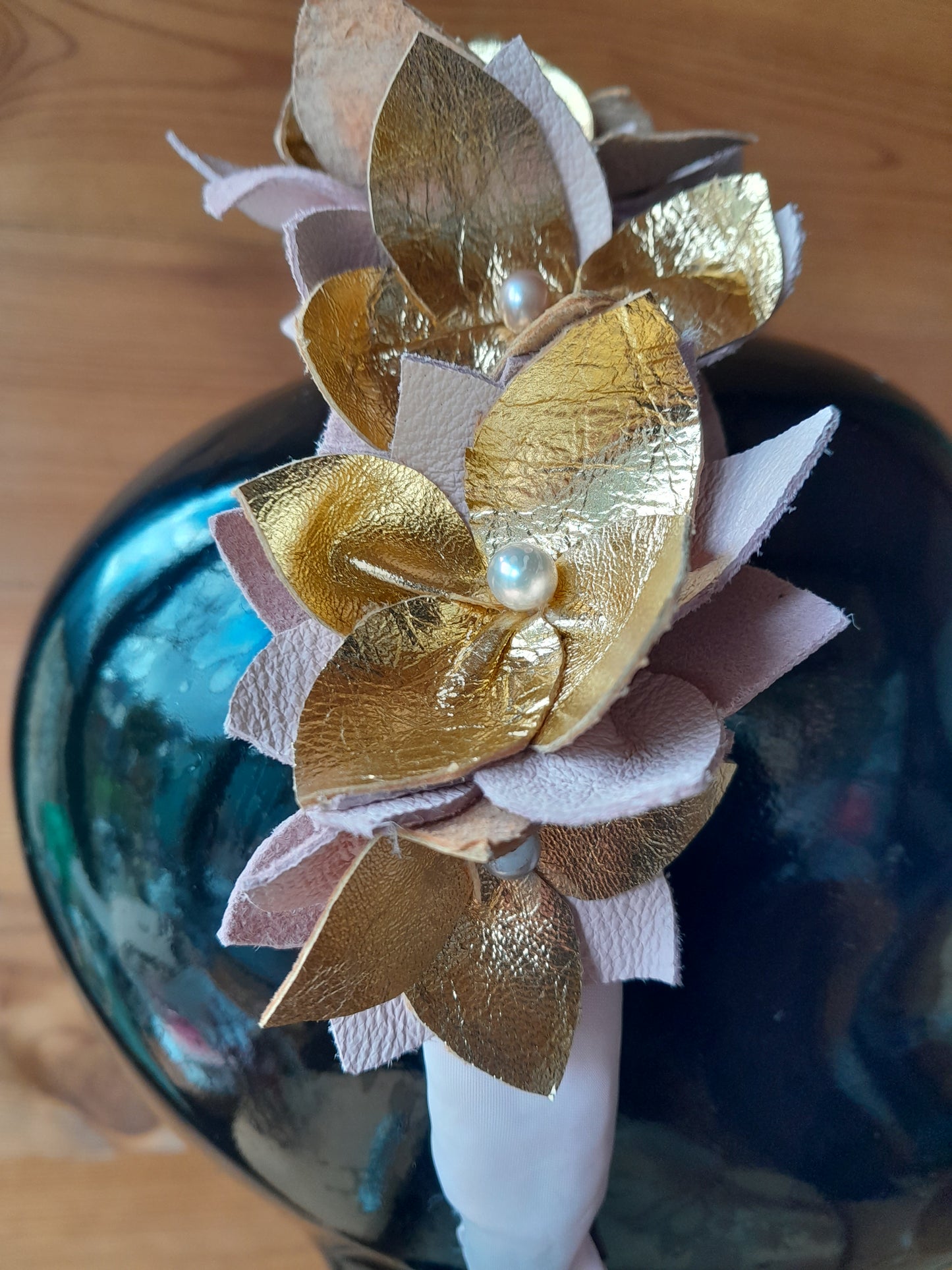 Close up leather gold fllower hairband alternative bride