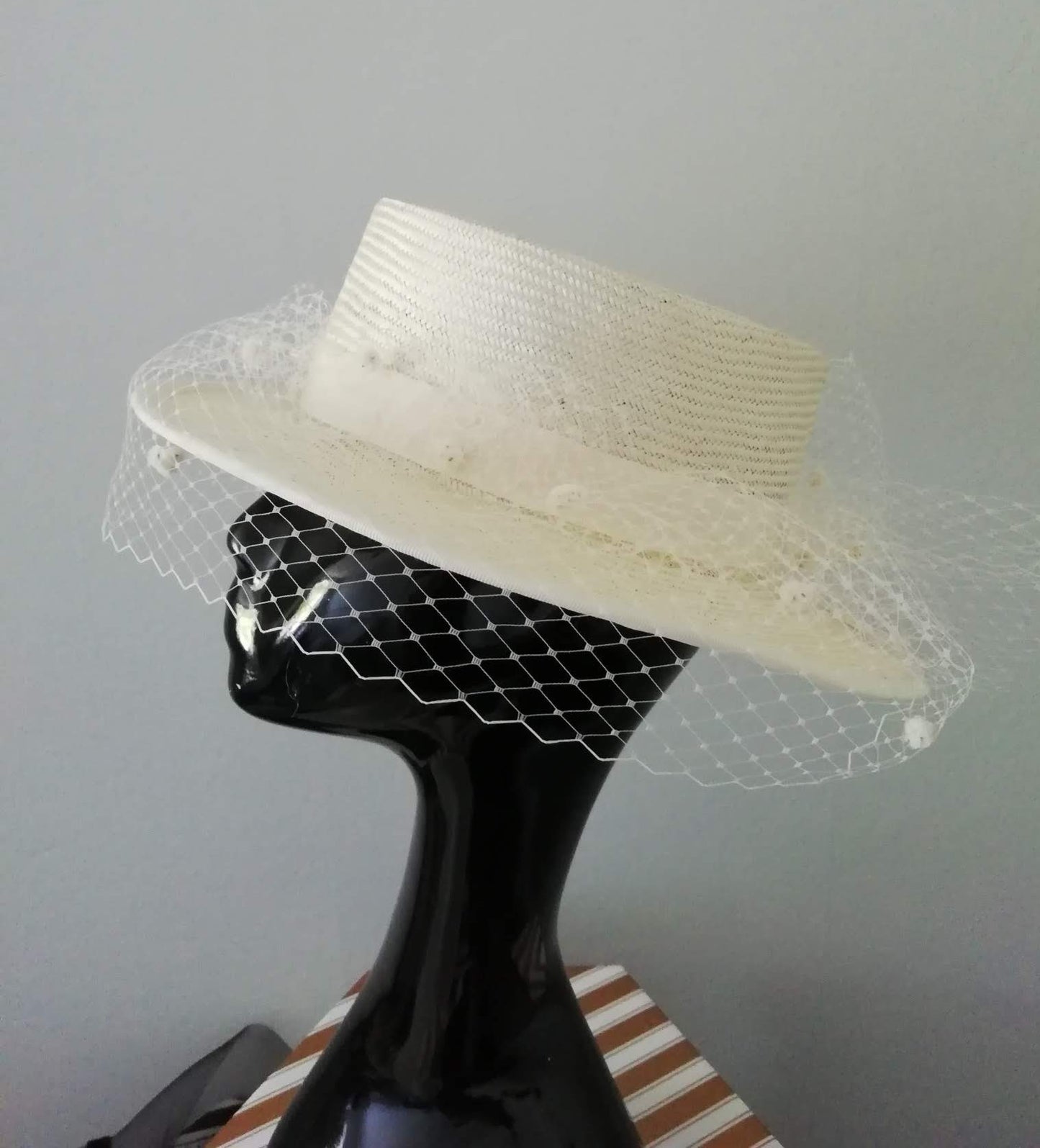 Straw boater with veiling