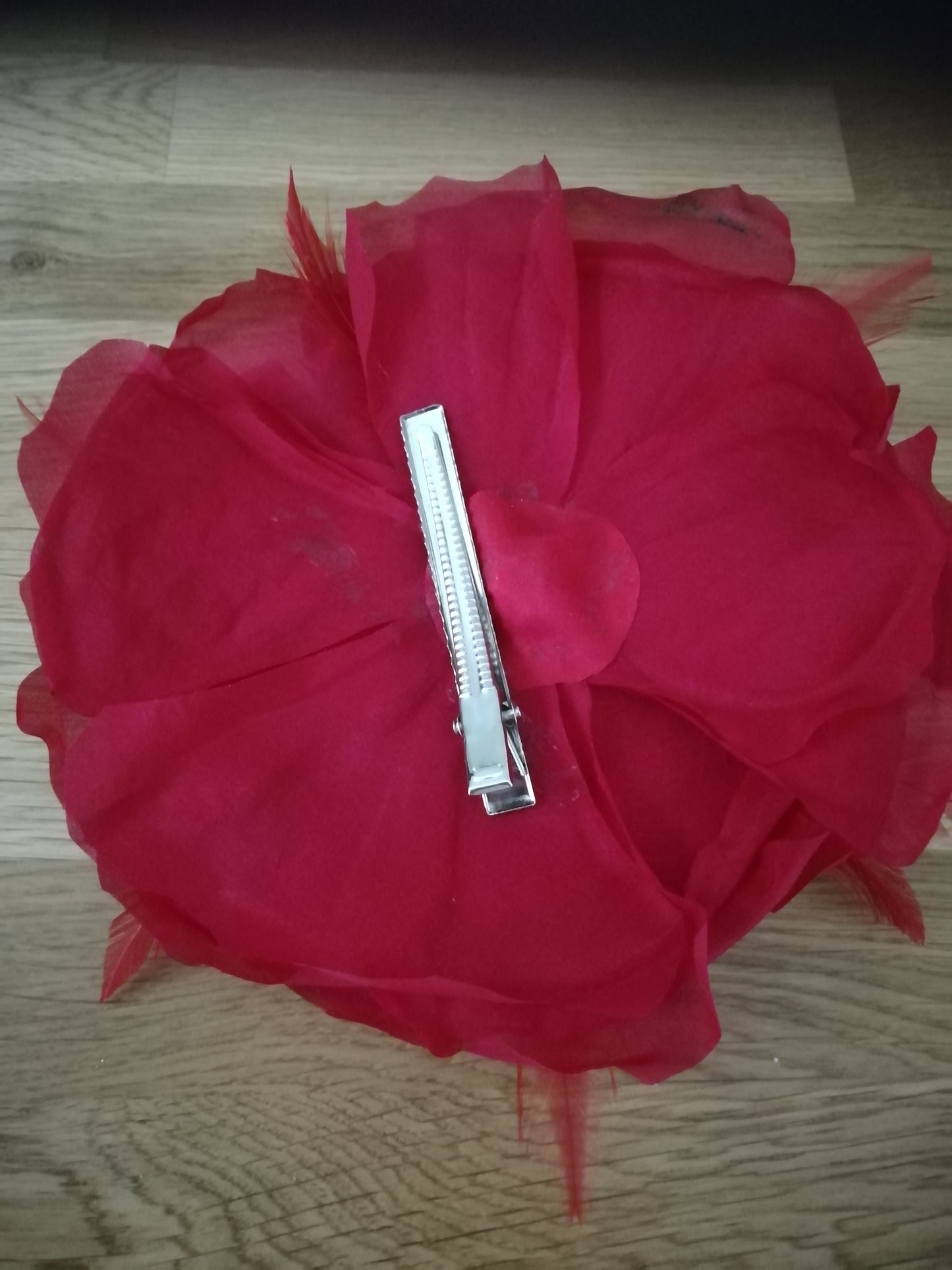 Large red flower underside view alternative bridal hair accessory