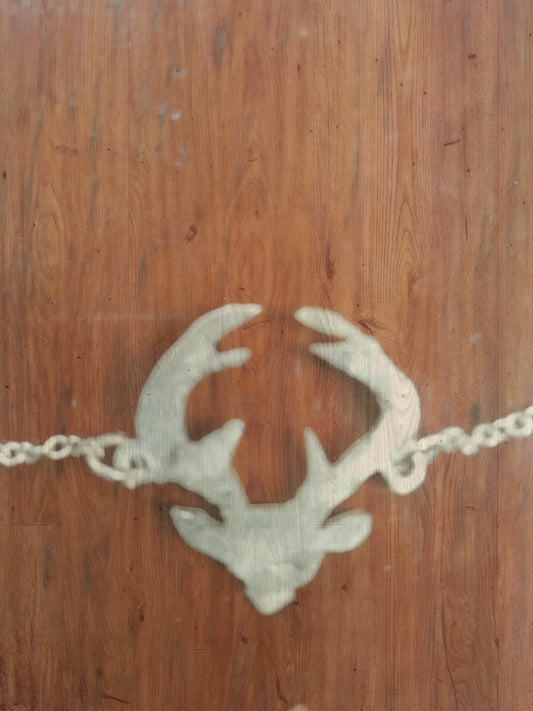 Stag pendant handcut from one shilling coin